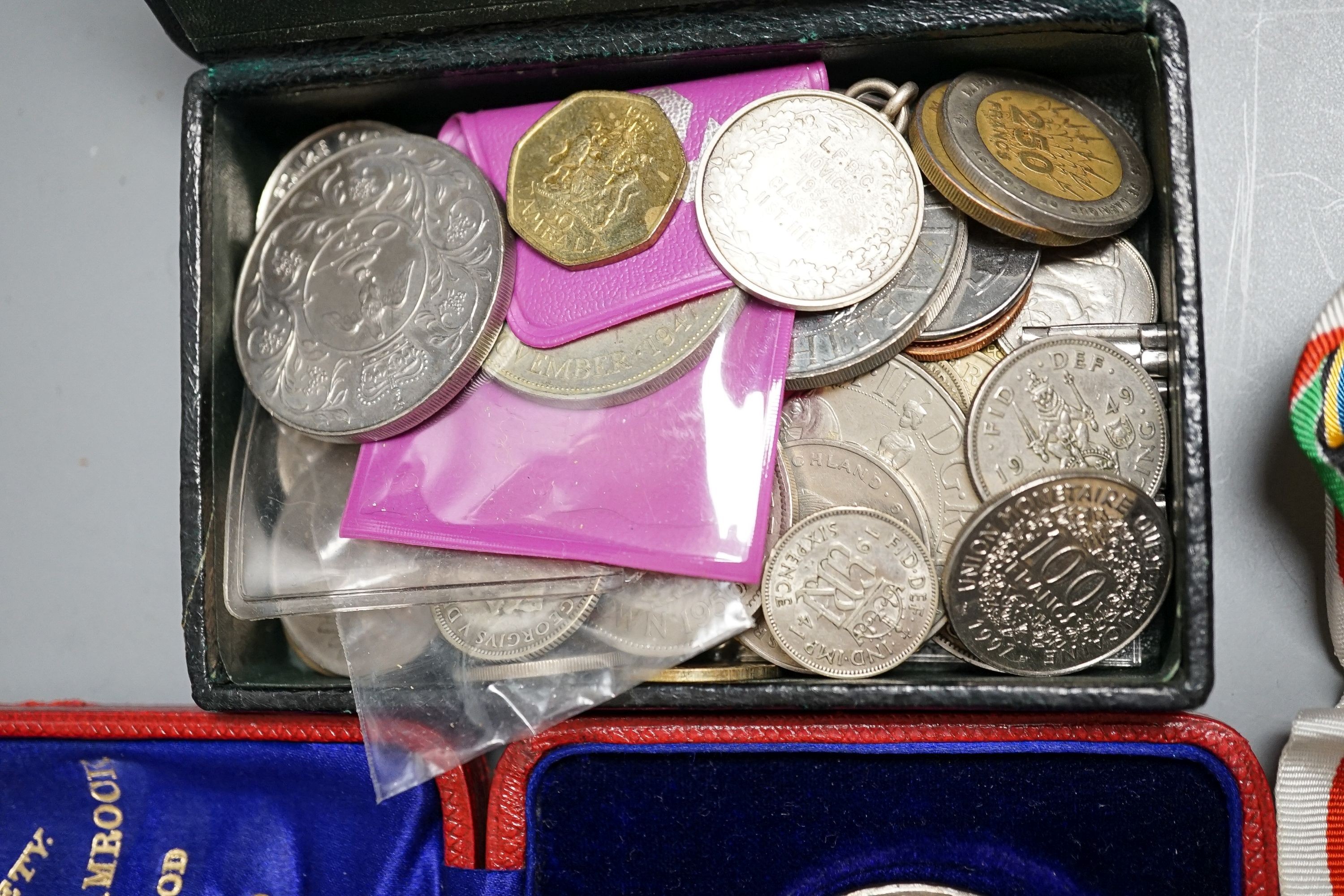 A group of UK coins and medallions, some silver issues